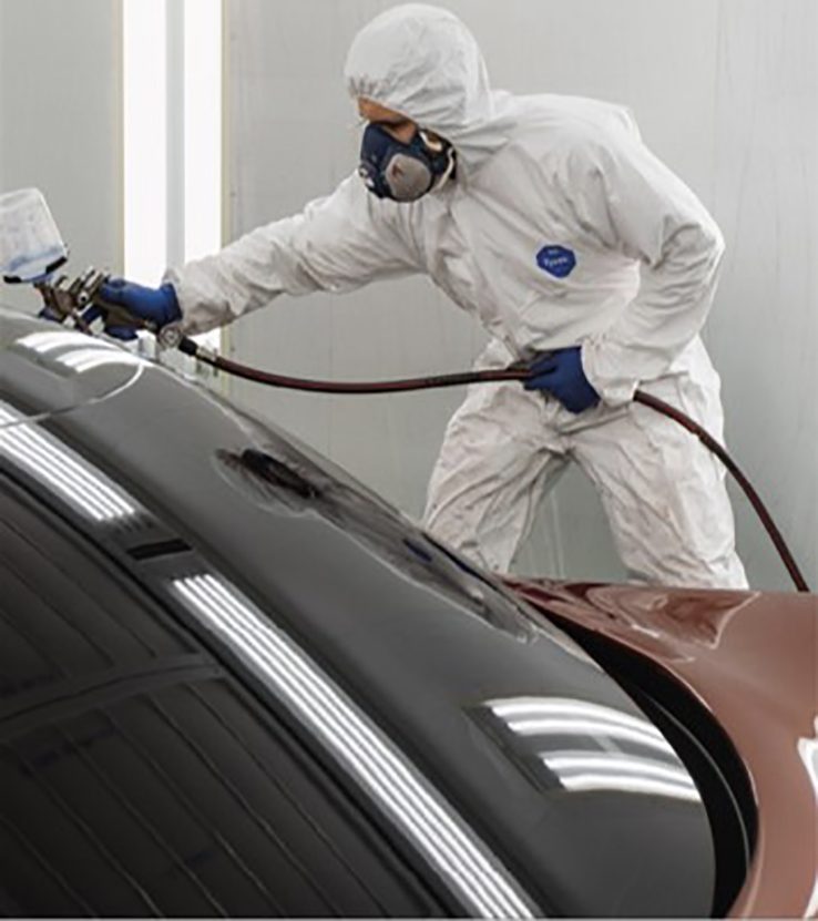 AULTRA craftsmanship — specialist coating a body part